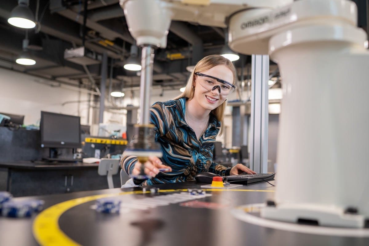 Commercial Photograph of a student working in a lab at CA Community Colleges